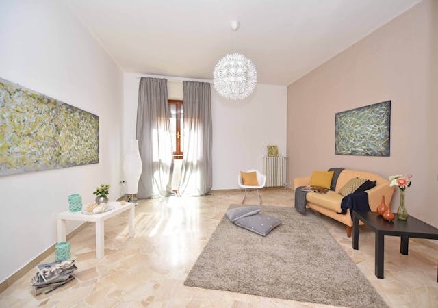 living room with white couch and carpet